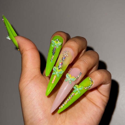 Flutter Me Fancy stiletto press-on nails in neon green with 3D butterfly details and rhinestone accents – bold, eye-catching glam nails