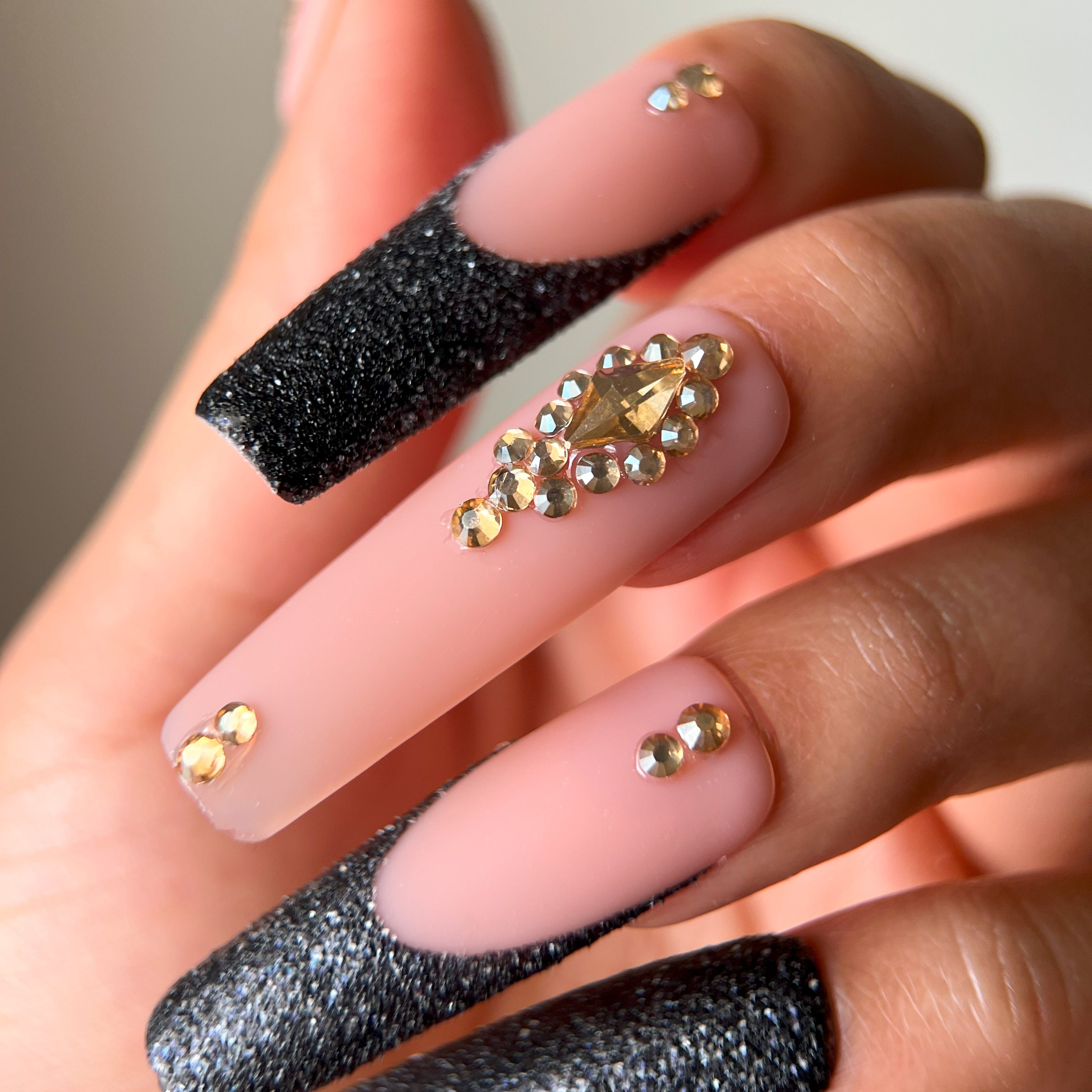 Bold XL square press-on nails with black glitter French tips and sparkling gold rhinestones – Golden Eclipse glam false nails